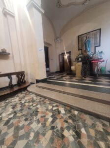 Path to the side chapel ossuary entrance inside San Bernardino alle Ossa